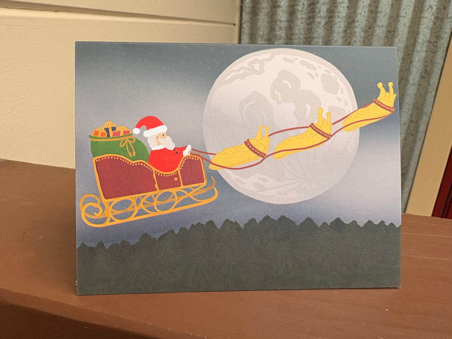 Banana slug Christmas Card with Santa Claus